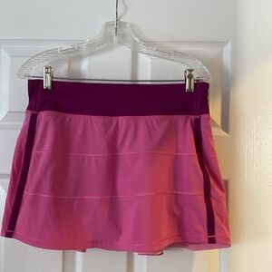 Lululemon Pace Rival Mid Rise skort, pink & purple.